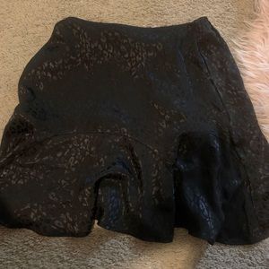 Francesca’s black satin skirt